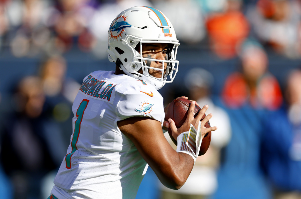 Miami Dolphins quarterback Tua Tagovailoa (1) drops back to pass against the Chicago Bears during the second half at Soldier Field.